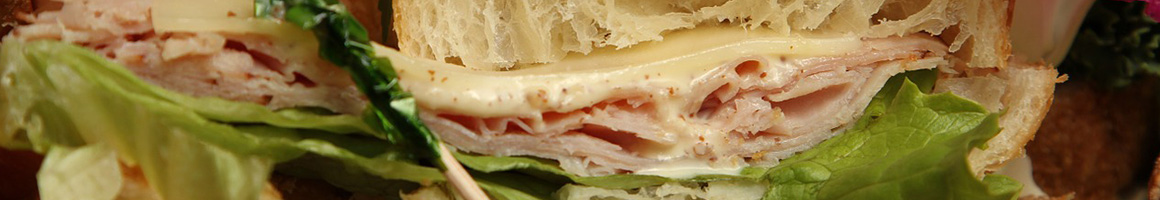 Eating Sandwich at Mino's Roast Beef restaurant in Lynn, MA.